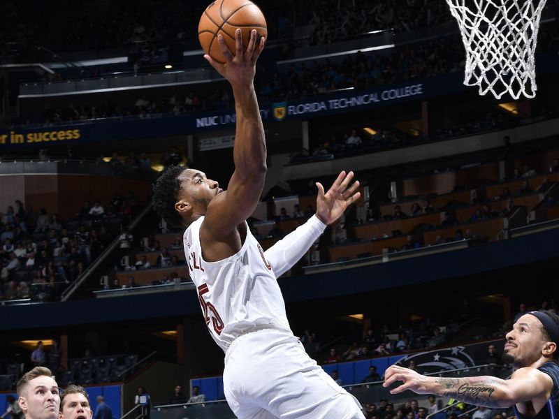 ORLANDO, FL - JANUARY 22: Donovan Mitchell #45 of the Cleveland Cavaliers drives to the basket during the game against the Orlando Magic on January 22, 2024 at Kia Center in Orlando, Florida. NOTE TO USER: User expressly acknowledges and agrees that, by downloading and or using this photograph, User is consenting to the terms and conditions of the Getty Images License Agreement. Mandatory Copyright Notice: Copyright 2024 NBAE (Photo by Gary Bassing/NBAE via Getty Images)