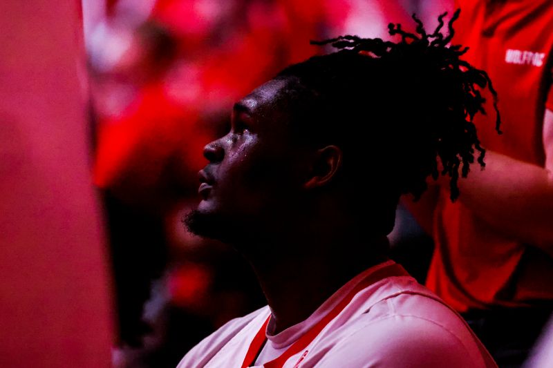 Feb 19, 2023; Raleigh, North Carolina, USA; North Carolina State Wolfpack forward D.J. Burns Jr. (30) looks on before the first half of the game against North Carolina Tar Heels at PNC Arena. Mandatory Credit: Jaylynn Nash-USA TODAY Sports