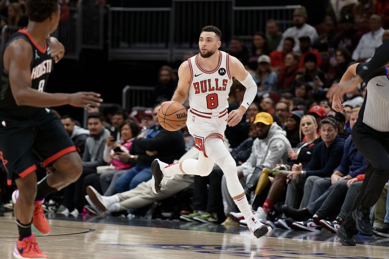 CHICAGO, ILLINOIS - JANUARY 10:  Zach Lavine #8 of the Chicago Bulls controls the ball against the Houston Rockets on January 10, 2024 at United Center in Chicago, Illinois.  NOTE TO USER: User expressly acknowledges and agrees that, by downloading and or using this photograph, User is consenting to the terms and conditions of the Getty Images License Agreement.  (Photo by Jamie Sabau/Getty Images)