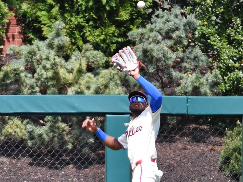 Apr 14, 2024; Philadelphia, Pennsylvania, USA; Philadelphia Phillies outfielder Johan Rojas (18) makes a catch during the second inning against the Pittsburgh Pirates at Citizens Bank Park. Mandatory Credit: Eric Hartline-USA TODAY Sports