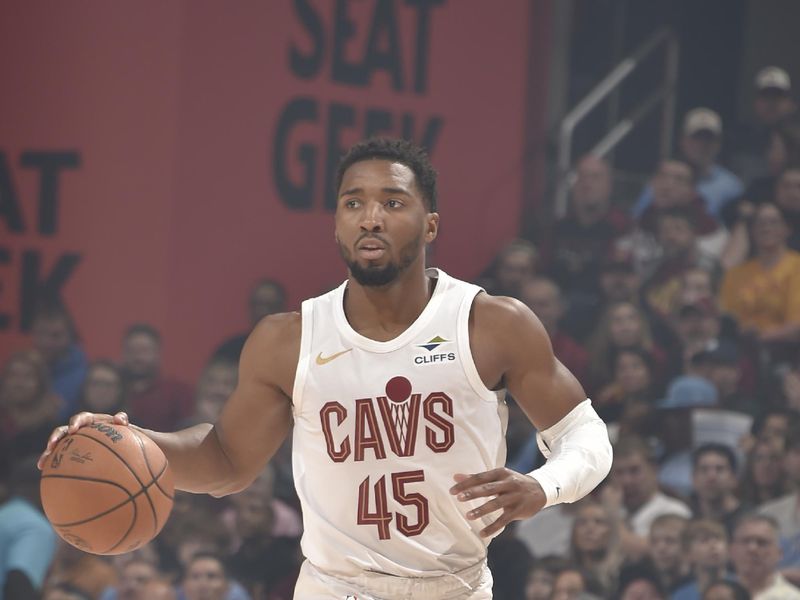 CLEVELAND, OH - MARCH 16: Donovan Mitchell #45 of the Cleveland Cavaliers dribbles the ball during the game against the Orlando Magic on March 16, 2025 at Rocket Arena in Cleveland, Ohio. NOTE TO USER: User expressly acknowledges and agrees that, by downloading and/or using this Photograph, user is consenting to the terms and conditions of the Getty Images License Agreement. Mandatory Copyright Notice: Copyright 2025 NBAE (Photo by David Liam Kyle/NBAE via Getty Images)