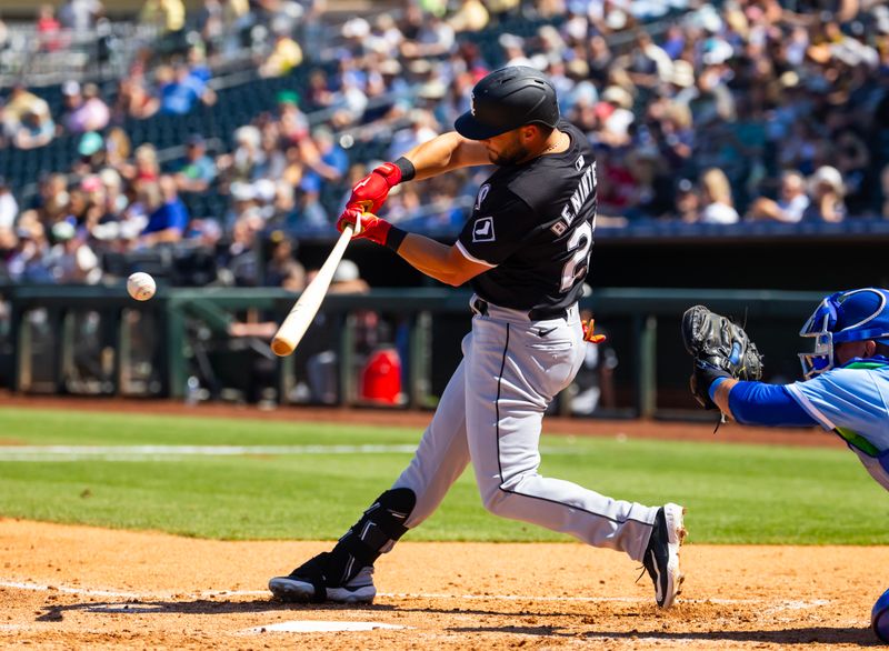 Mar 21, 2024; Surprise, Arizona, USA; Chicago White Sox outfielder Andrew Benintendi against the Kansas City Royals during a spring training baseball game at Surprise Stadium. Mandatory Credit: Mark J. Rebilas-USA TODAY Sports