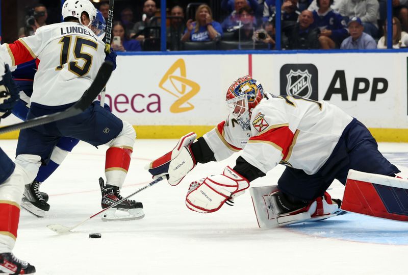 Apr 27, 2024; Tampa, Florida, USA; Florida Panthers goaltender Sergei Bobrovsky (72) makes a save against the Tampa Bay Lightning during the third period in game four of the first round of the 2024 Stanley Cup Playoffs at Amalie Arena. Mandatory Credit: Kim Klement Neitzel-USA TODAY Sports