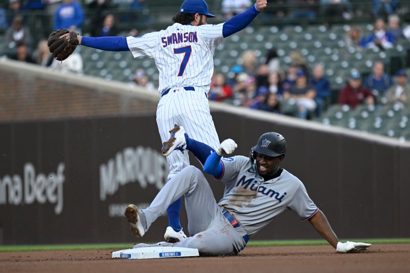 May 12, 2025; Chicago, Illinois, USA;  Chicago Cubs shortstop Dansby Swanson (7) throws to first for a double play after forcing Miami Marlins outfielder Jesús Sánchez (7) out during the first inning at Wrigley Field. Mandatory Credit: Matt Marton-Imagn Images