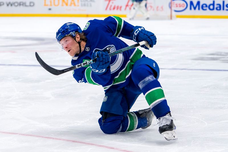 Oct 4, 2024; Vancouver, British Columbia, CAN; Vancouver Canucks forward Brock Boeser (6) shoots against the Edmonton Oilers during the third period at Rogers Arena. Mandatory Credit: Bob Frid-Imagn Images