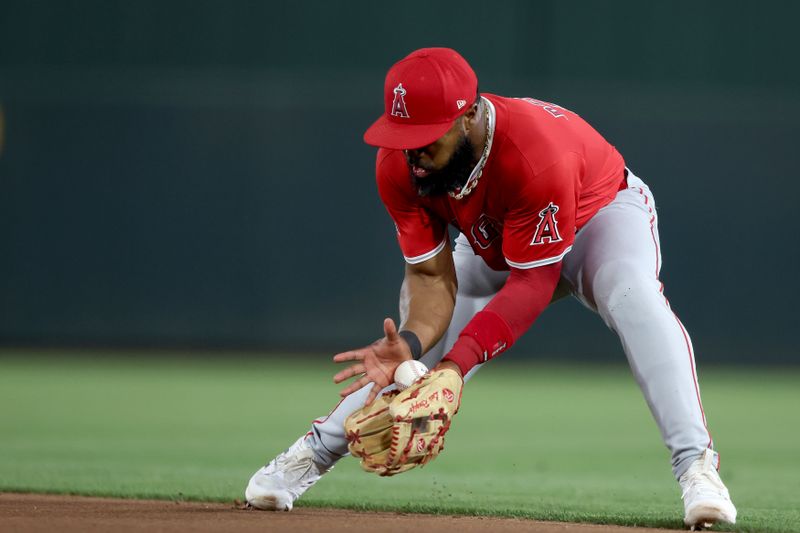 May 19, 2025; West Sacramento, California, USA; Los Angeles Angels second baseman Luis Rengifo (2) fields a ground ball against the Athletics during the sixth inning at Sutter Health Park. Mandatory Credit: Dennis Lee-Imagn Images