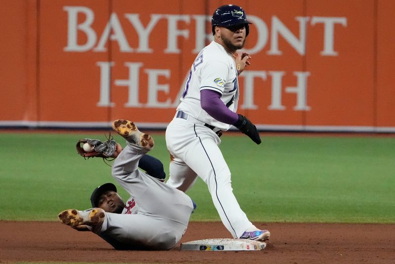 Jul 7, 2023; St. Petersburg, Florida, USA;  Tampa Bay Rays designated hitter Harold Ramirez (43) is caught stealing by Atlanta Braves second baseman Ozzie Albies (1) during the seventh inning at Tropicana Field. Mandatory Credit: Dave Nelson-USA TODAY Sports