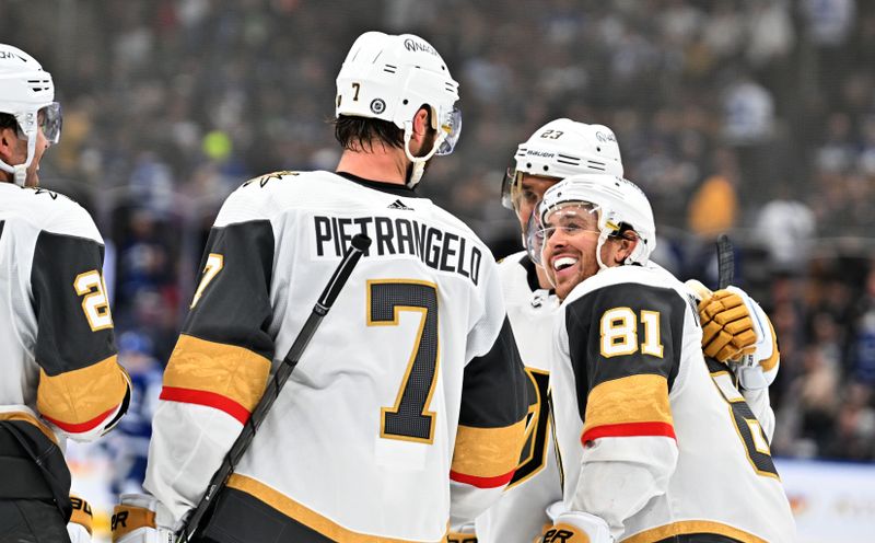 Feb 27, 2024; Toronto, Ontario, CAN;  Vegas Golden Knights defenseman Alex Pietrangelo (7) celebrates with forward Jonathan Marchessault (81) and defenseman Alec Martinez (23) after scoring a goal against the Toronto Maple Leafs in the third period at Scotiabank Arena. Mandatory Credit: Dan Hamilton-USA TODAY Sports