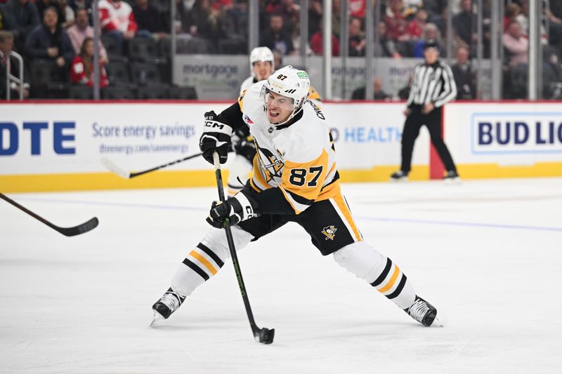 Oct 10, 2024; Detroit, Michigan, USA; Pittsburgh Penguins center Sidney Crosby (87) shoots during the first period against the Detroit Red Wings at Little Caesars Arena. Mandatory Credit: Tim Fuller-Imagn Images