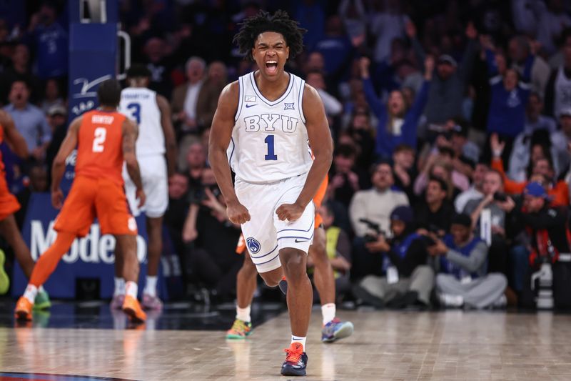 Dec 9, 2025; New York, New York, USA;  BYU Cougars guard Robert Wright III (1) celebrates in the second half against the Clemson Tigers at Madison Square Garden. Mandatory Credit: Wendell Cruz-Imagn Images