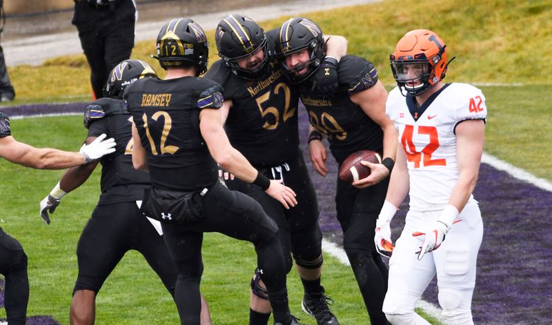 Dec 12, 2020; Evanston, Illinois, USA; Northwestern Wildcats tight end Charlie Mangieri (89) celebrates his touchdown against the Illinois Fighting Illini with his teammates during the first half at Ryan Field. Mandatory Credit: David Banks-USA TODAY Sports