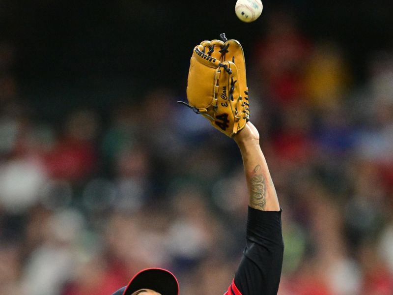 Aug 22, 2023; Cleveland, Ohio, USA; Cleveland Guardians relief pitcher Emmanuel Clase (48) fields a ball hit by Los Angeles Dodgers third baseman Max Muncy (not pictured) during the ninth inning at Progressive Field. Mandatory Credit: Ken Blaze-USA TODAY Sports