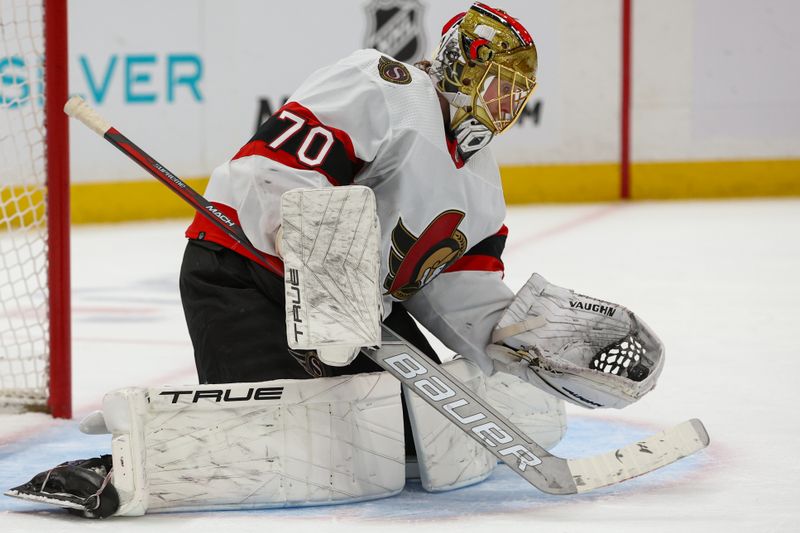 Mar 16, 2024; Elmont, New York, USA; Ottawa Senators goaltender Joonas Korpisalo (70) makes a save against against the New York Islanders during the second period  at UBS Arena. Mandatory Credit: Thomas Salus-USA TODAY Sports