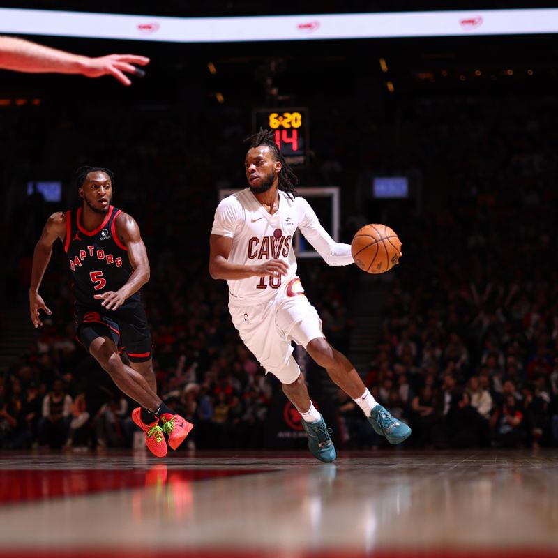 TORONTO, CANADA - FEBRUARY 10: Darius Garland #10 of the Cleveland Cavaliers dribbles the ball during the game against the Toronto Raptors on February 10, 2024 at the Scotiabank Arena in Toronto, Ontario, Canada.  NOTE TO USER: User expressly acknowledges and agrees that, by downloading and or using this Photograph, user is consenting to the terms and conditions of the Getty Images License Agreement.  Mandatory Copyright Notice: Copyright 2024 NBAE (Photo by Vaughn Ridley/NBAE via Getty Images)