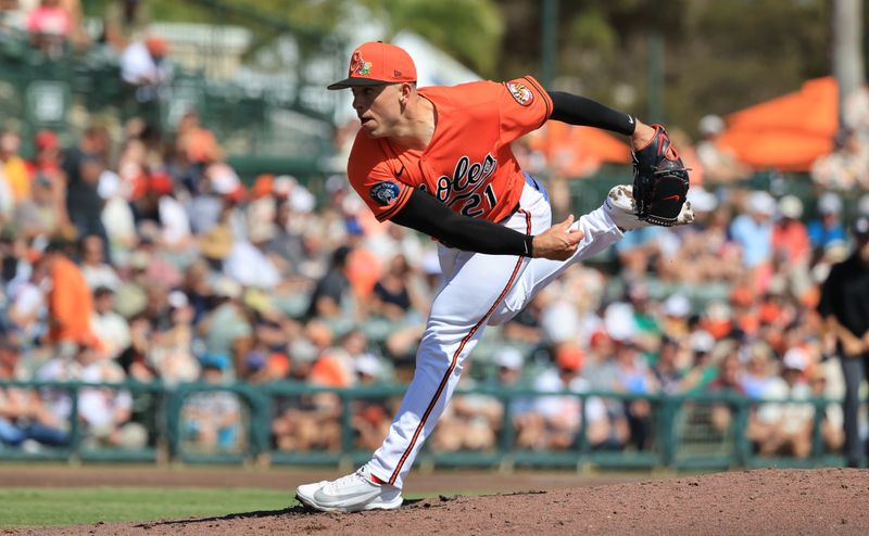 Feb 28, 2026; Sarasota, Florida, USA; Baltimore Orioles pitcher Ryan Helsley (21) throws a pitch during the third inning against the Atlanta Braves at Ed Smith Stadium. Mandatory Credit: Kim Klement Neitzel-Imagn Images