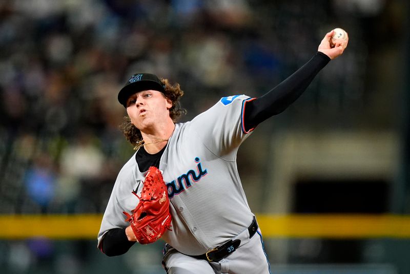 Sep 17, 2025; Denver, Colorado, USA; Miami Marlins starting pitcher Ryan Weathers (35) delivers a pitch in the first inning against the Colorado Rockies at Coors Field. Mandatory Credit: Ron Chenoy-Imagn Images