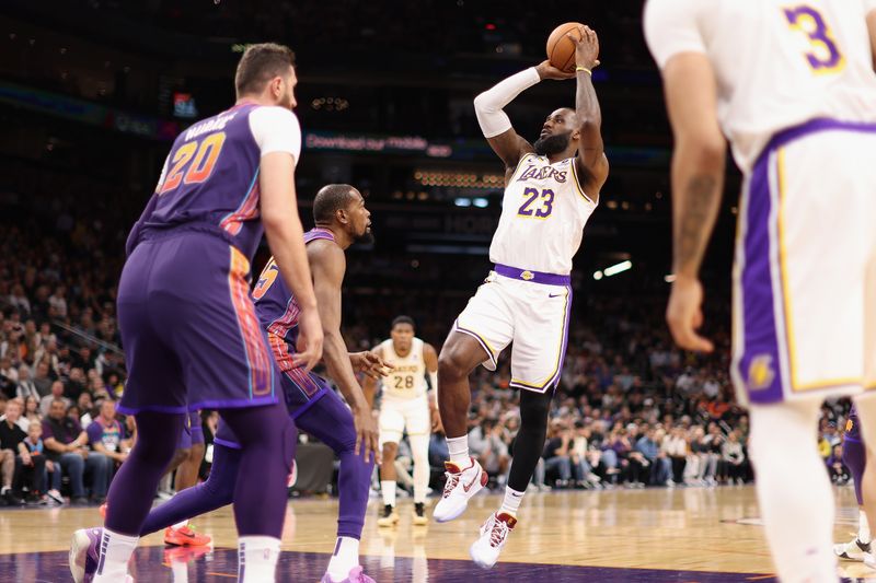 PHOENIX, ARIZONA - FEBRUARY 25: LeBron James #23 of the Los Angeles Lakers attempts a shot against the Phoenix Suns during the first half of the NBA game at Footprint Center on February 25, 2024 in Phoenix, Arizona. NOTE TO USER: User expressly acknowledges and agrees that, by downloading and or using this photograph, User is consenting to the terms and conditions of the Getty Images License Agreement.  (Photo by Christian Petersen/Getty Images)