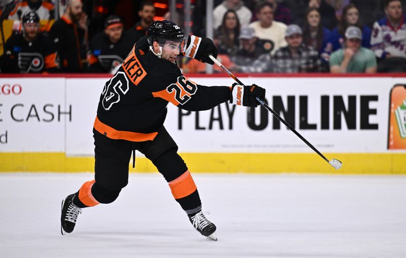 Nov 24, 2023; Philadelphia, Pennsylvania, USA; Philadelphia Flyers defenseman Sean Walker (26) shoots against the New York Rangers in the second period at Wells Fargo Center. Mandatory Credit: Kyle Ross-USA TODAY Sports