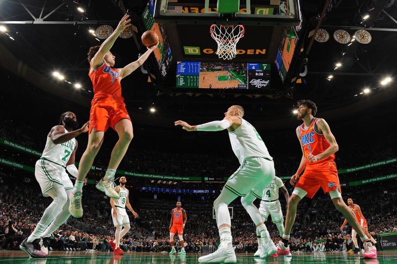 BOSTON, MA - APRIL 3: Josh Giddey #3 of the Oklahoma City Thunder drives to the basket during the game against the Boston Celtics on April 3, 2024 at the TD Garden in Boston, Massachusetts. NOTE TO USER: User expressly acknowledges and agrees that, by downloading and or using this photograph, User is consenting to the terms and conditions of the Getty Images License Agreement. Mandatory Copyright Notice: Copyright 2024 NBAE  (Photo by Brian Babineau/NBAE via Getty Images)