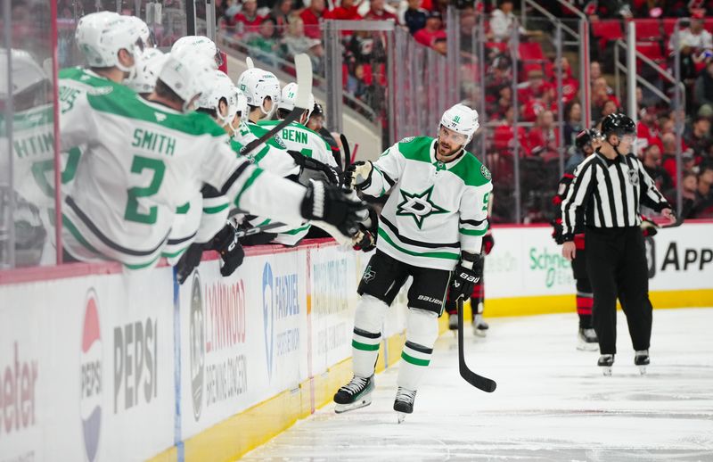 Nov 25, 2024; Raleigh, North Carolina, USA;  Dallas Stars center Tyler Seguin (91) celebrates his goal against the Carolina Hurricanes during the first period at Lenovo Center. Mandatory Credit: James Guillory-Imagn Images
