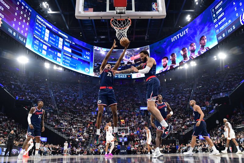 INGLEWOOD, CA - OCTOBER 23: Kai Jones #23 of the LA Clippers rebounds the ball during the game against the Phoenix Suns on October 23, 2024 at Intuit Dome in Los Angeles, California. NOTE TO USER: User expressly acknowledges and agrees that, by downloading and/or using this Photograph, user is consenting to the terms and conditions of the Getty Images License Agreement. Mandatory Copyright Notice: Copyright 2024 NBAE (Photo by Adam Pantozzi/NBAE via Getty Images)