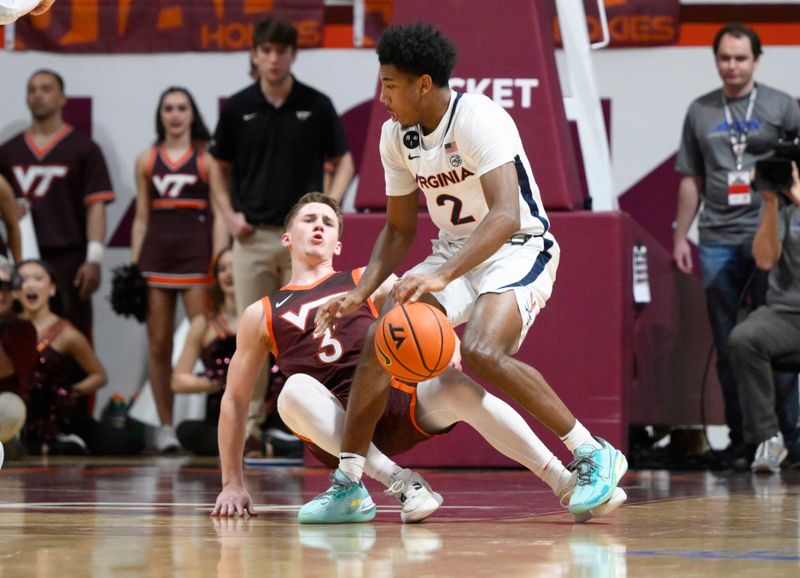 Feb 4, 2023; Blacksburg, Virginia, USA;  Virginia Cavaliers guard Reece Beekman (2) collides with Virginia Tech Hokies guard Sean Pedulla (3) in the second half at Cassell Coliseum. Mandatory Credit: Lee Luther Jr.-USA TODAY Sports