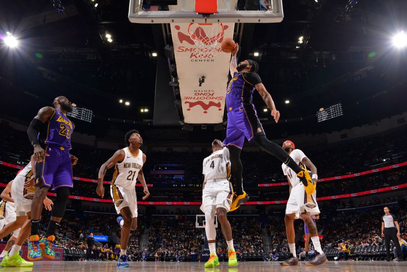 NEW ORLEANS, LA - NOVEMBER 16: Anthony Davis #3 of the Los Angeles Lakers drives to the basket during the game against the New Orleans Pelicans on November 16, 2024 at the Smoothie King Center in New Orleans, Louisiana. NOTE TO USER: User expressly acknowledges and agrees that, by downloading and or using this Photograph, user is consenting to the terms and conditions of the Getty Images License Agreement. Mandatory Copyright Notice: Copyright 2024 NBAE (Photo by Jesse D. Garrabrant/NBAE via Getty Images)