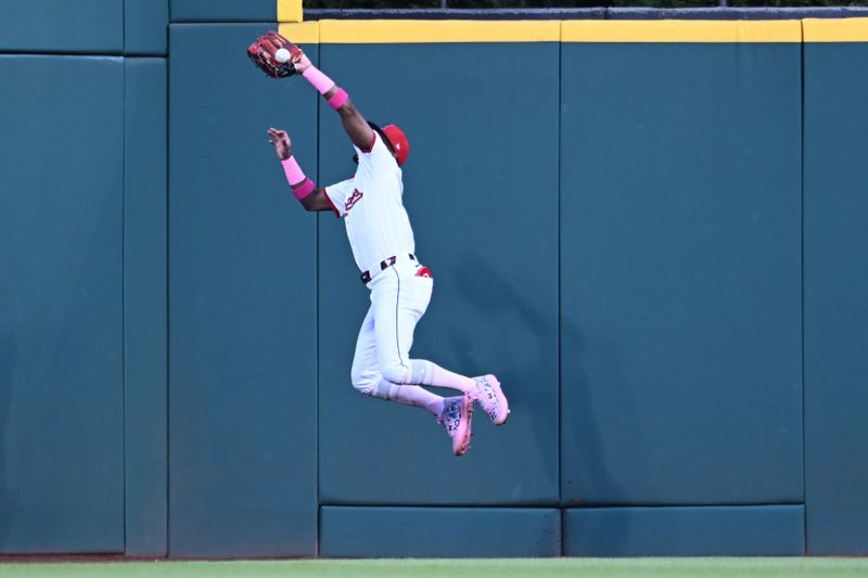 May 11, 2025; Cleveland, Ohio, USA; Cleveland Guardians center fielder Angel Martinez (1) fails to catch a ball hit by Philadelphia Phillies catcher J.T. Realmuto (not pictured) during the second inning at Progressive Field. Mandatory Credit: Ken Blaze-Imagn Images