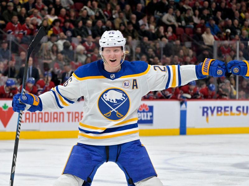 Feb 21, 2024; Montreal, Quebec, CAN; Buffalo Sabres defenseman Rasmus Dahlin (26) celebrates after a goal scores by the Sabres against the Montreal Canadiens during the second period at the Bell Centre. Mandatory Credit: Eric Bolte-USA TODAY Sports