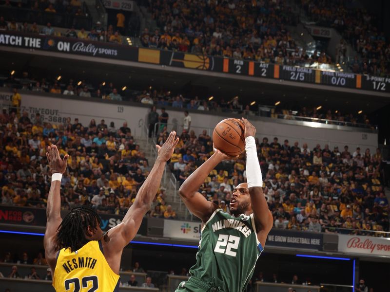 INDIANAPOLIS, IN - APRIL 28: Khris Middleton #22 of the Milwaukee Bucks shoots the ball during the game against the Indiana Pacers during Round 1 Game 4 of the 2024 NBA Playoffs on April 28, 2024 at Gainbridge Fieldhouse in Indianapolis, Indiana. NOTE TO USER: User expressly acknowledges and agrees that, by downloading and or using this Photograph, user is consenting to the terms and conditions of the Getty Images License Agreement. Mandatory Copyright Notice: Copyright 2024 NBAE (Photo by Nathaniel S. Butler/NBAE via Getty Images)