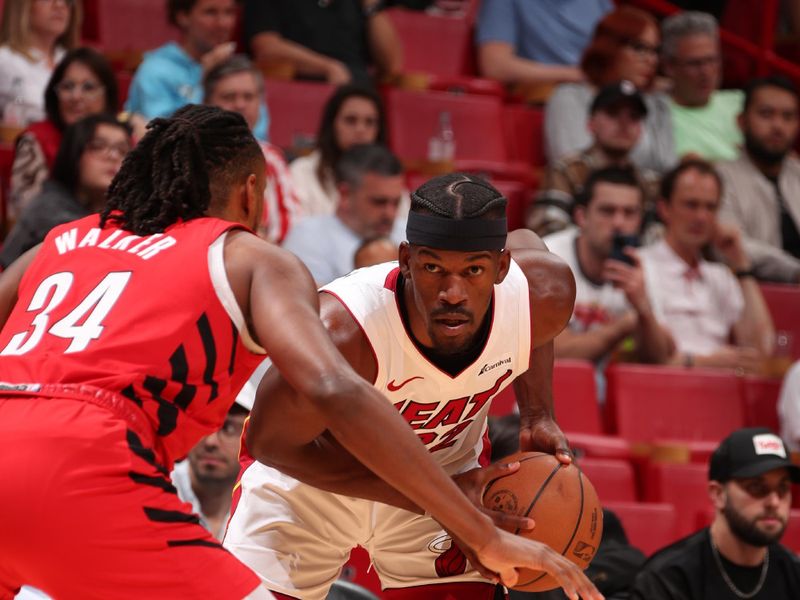 MIAMI, FL - MARCH 29: Jimmy Butler #22 of the Miami Heat handles the ball during the game against the Portland Trail Blazers on March 29, 2024 at Kaseya Center in Miami, Florida. NOTE TO USER: User expressly acknowledges and agrees that, by downloading and or using this Photograph, user is consenting to the terms and conditions of the Getty Images License Agreement. Mandatory Copyright Notice: Copyright 2024 NBAE (Photo by Issac Baldizon/NBAE via Getty Images)