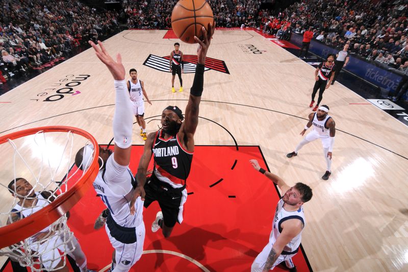 PORTLAND, OR - DECEMBER 1: Jerami Grant #9 of the Portland Trail Blazers drives to the basket during the game against the Dallas Mavericks on December 1, 2024 at the Moda Center Arena in Portland, Oregon. NOTE TO USER: User expressly acknowledges and agrees that, by downloading and or using this photograph, user is consenting to the terms and conditions of the Getty Images License Agreement. Mandatory Copyright Notice: Copyright 2024 NBAE (Photo by Cameron Browne/NBAE via Getty Images)