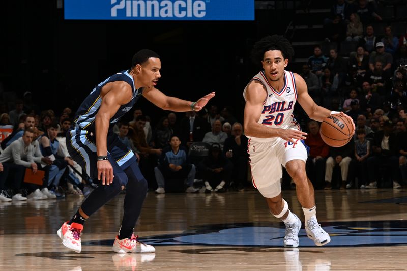 MEMPHIS, TN - NOVEMBER 20: Jared McCain #20 of the Philadelphia 76ers dribbles the ball during the game against the Memphis Grizzlies on November 20, 2024 at FedExForum in Memphis, Tennessee. NOTE TO USER: User expressly acknowledges and agrees that, by downloading and or using this photograph, User is consenting to the terms and conditions of the Getty Images License Agreement. Mandatory Copyright Notice: Copyright 2024 NBAE (Photo by Grant Burke/NBAE via Getty Images)