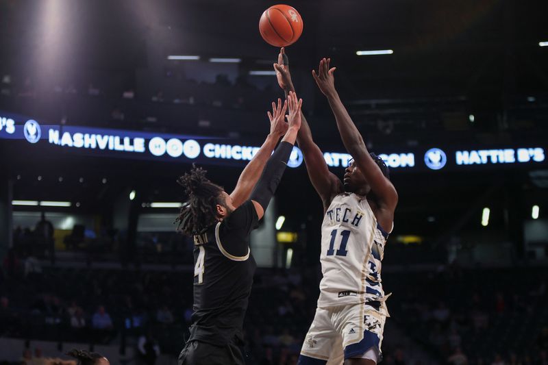 Feb 6, 2024; Atlanta, Georgia, USA; Georgia Tech Yellow Jackets forward Baye Ndongo (11) shoots over Wake Forest Demon Deacons forward Efton Reid III (4) in the second half at McCamish Pavilion. Mandatory Credit: Brett Davis-USA TODAY Sports
