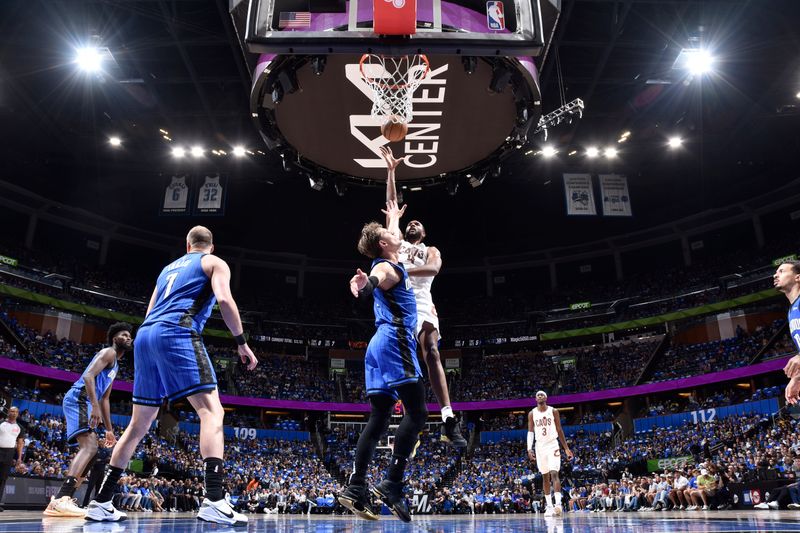 ORLANDO, FL - APRIL 27: Evan Mobley #4 of the Cleveland Cavaliers shoots the ball during the game against the Orlando Magic during Round 1 Game 4 of the 2024 NBA Playoffs on April 27, 2024 at the Kia Center in Orlando, Florida. NOTE TO USER: User expressly acknowledges and agrees that, by downloading and or using this photograph, User is consenting to the terms and conditions of the Getty Images License Agreement. Mandatory Copyright Notice: Copyright 2024 NBAE (Photo by Fernando Medina/NBAE via Getty Images)