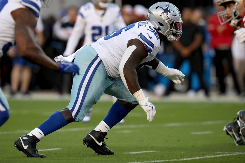 Dallas Cowboys defensive tackle Neville Gallimore (96) rushes during an NFL football game against the San Francisco 49ers, Sunday, Oct 8, 2023, in Santa Clara, Calif. (AP Photo/Scot Tucker)