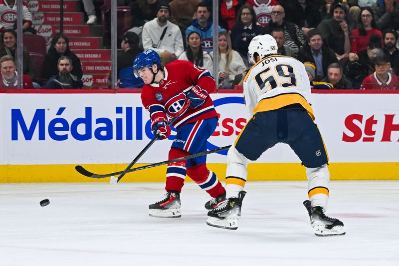 Dec 5, 2024; Montreal, Quebec, CAN; Montreal Canadiens right wing Cole Caufield (13) shoots the puck against Nashville Predators defenseman Roman Josi (59) during the second period at Bell Centre. Mandatory Credit: David Kirouac-Imagn Images