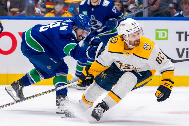 Apr 23, 2024; Vancouver, British Columbia, CAN; Vancouver Canucks forward Conor Garland (8) shoots around Nashville Predators forward Tommy Novak (82) during the third period in game two of the first round of the 2024 Stanley Cup Playoffs at Rogers Arena. Mandatory Credit: Bob Frid-USA TODAY Sports