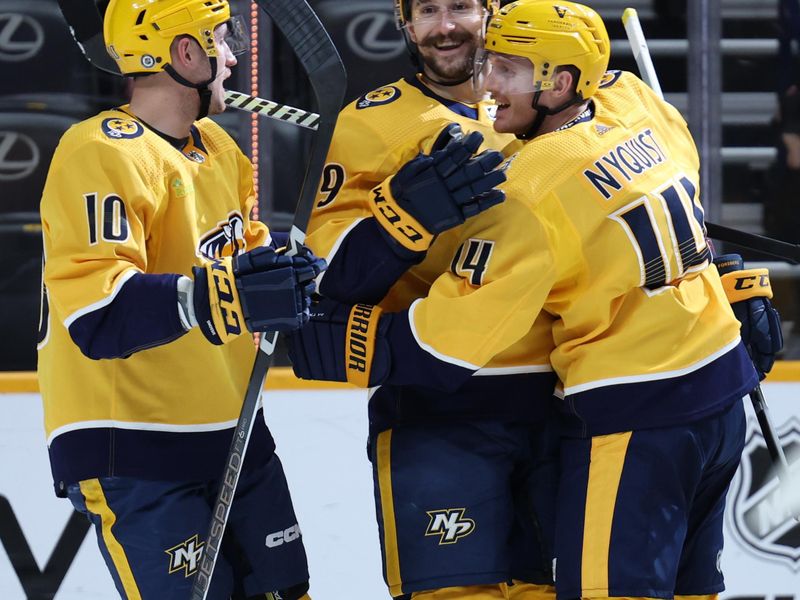 Mar 7, 2024; Nashville, Tennessee, USA; Nashville Predators left wing Filip Forsberg (9) celebrates a goal with Nashville Predators center Colton Sissons (10) and Nashville Predators center Gustav Nyquist (14) during their game against the Buffalo Sabres at Bridgestone Arena. Mandatory Credit: Alan Poizner-USA TODAY Sports