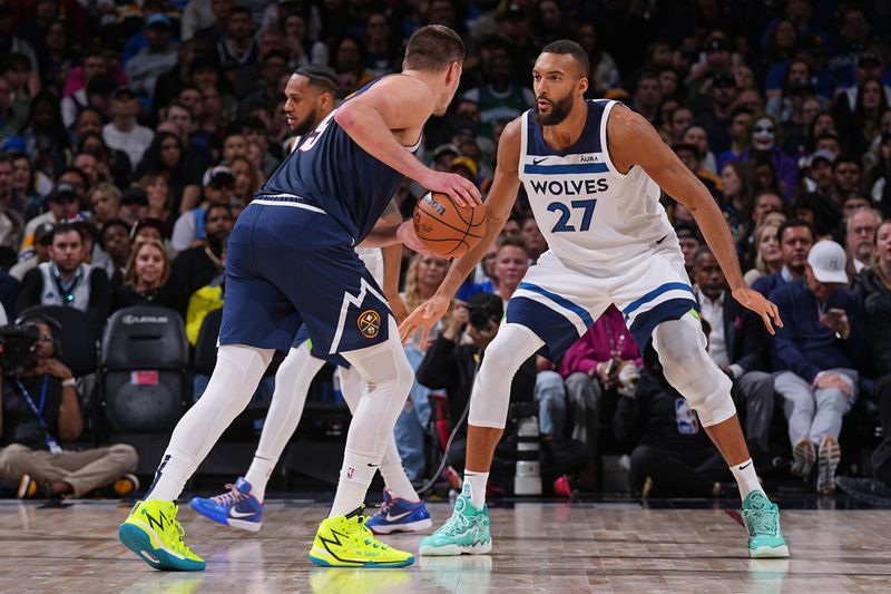 DENVER, CO - APRIL 10: Rudy Gobert #27 of the Minnesota Timberwolves plays defense during the game against the Denver Nuggets on April 10, 2024 at the Ball Arena in Denver, Colorado. NOTE TO USER: User expressly acknowledges and agrees that, by downloading and/or using this Photograph, user is consenting to the terms and conditions of the Getty Images License Agreement. Mandatory Copyright Notice: Copyright 2024 NBAE (Photo by Bart Young/NBAE via Getty Images)