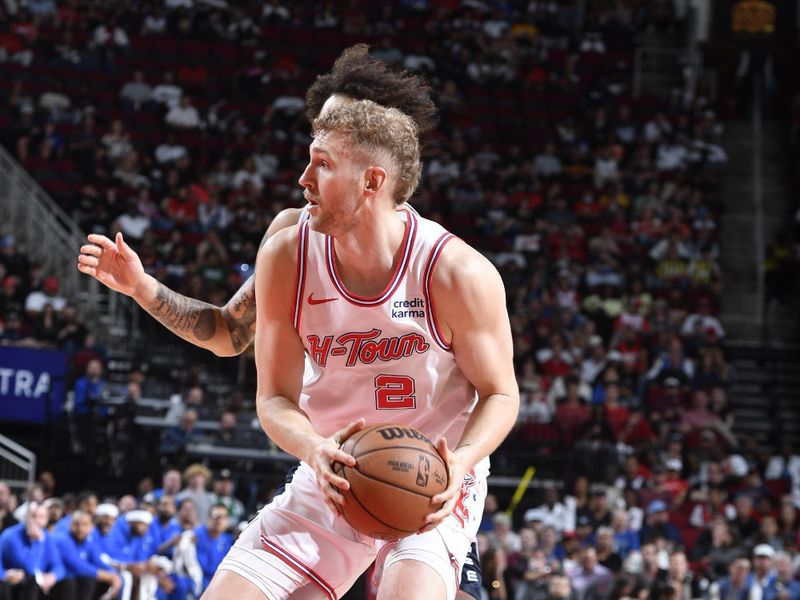 HOUSTON, TX - MARCH 31: Jock Landale #2 of the Houston Rockets handles the ball during the game against the Dallas Mavericks on March 31, 2024 at the Toyota Center in Houston, Texas. NOTE TO USER: User expressly acknowledges and agrees that, by downloading and or using this photograph, User is consenting to the terms and conditions of the Getty Images License Agreement. Mandatory Copyright Notice: Copyright 2024 NBAE (Photo by Logan Riely/NBAE via Getty Images)