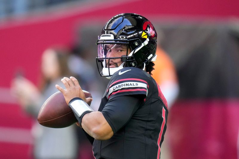 Arizona Cardinals quarterback Kyler Murray warms up prior to an NFL football game against the Los Angeles Rams Sunday, Nov. 26, 2023, in Glendale, Ariz. The Rams won 37-14. (AP Photo/Ross D. Franklin)