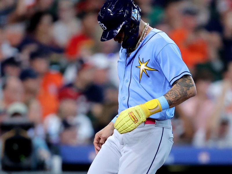 Jul 30, 2023; Houston, Texas, USA; Tampa Bay Rays center fielder Jose Siri (22) crosses home plate to score a run during the fourth inning at Minute Maid Park. Mandatory Credit: Erik Williams-USA TODAY Sports