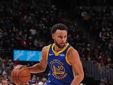 DENVER, CO - DECEMBER 25: Stephen Curry #30 of the Golden State Warriors handles the ball during the gameagainst the Denver Nuggets on December 25, 2023 at the Ball Arena in Denver, Colorado. NOTE TO USER: User expressly acknowledges and agrees that, by downloading and/or using this Photograph, user is consenting to the terms and conditions of the Getty Images License Agreement. Mandatory Copyright Notice: Copyright 2023 NBAE (Photo by Bart Young/NBAE via Getty Images)