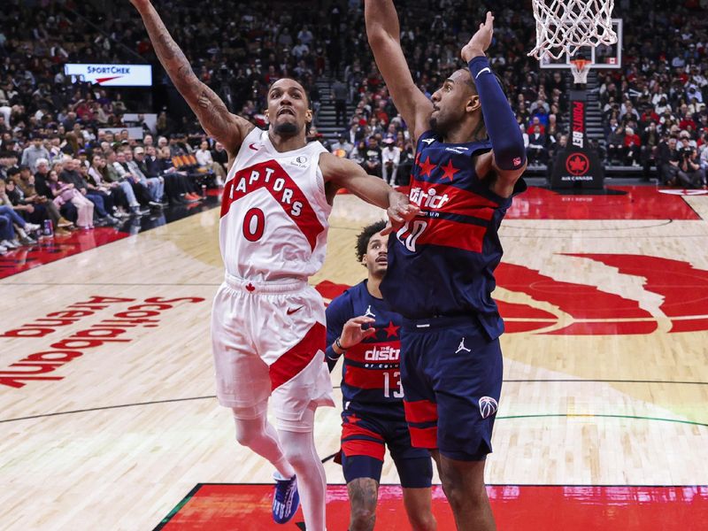 TORONTO, CANADA - MARCH 10: A.J. Lawson #0 of the Toronto Raptors drives to the basket during the game against the Washington Wizards on March 10, 2025 at the Scotiabank Arena in Toronto, Ontario, Canada.  NOTE TO USER: User expressly acknowledges and agrees that, by downloading and or using this Photograph, user is consenting to the terms and conditions of the Getty Images License Agreement.  Mandatory Copyright Notice: Copyright 2025 NBAE (Photo by Vaughn Ridley/NBAE via Getty Images)