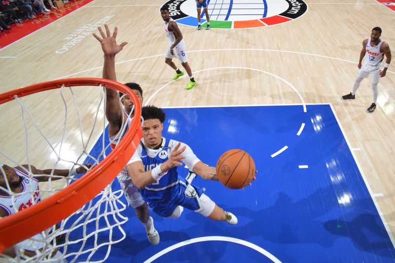 PHILADELPHIA, PA - APRIL 3:  Ryan Rollins #13 of the Milwaukee Bucks drives to the basket during the game against the Philadelphia 76ers on April 3, 2025 at the Wells Fargo Center in Philadelphia, Pennsylvania NOTE TO USER: User expressly acknowledges and agrees that, by downloading and/or using this Photograph, user is consenting to the terms and conditions of the Getty Images License Agreement. Mandatory Copyright Notice: Copyright 2025 NBAE (Photo by Jesse D. Garrabrant/NBAE via Getty Images)