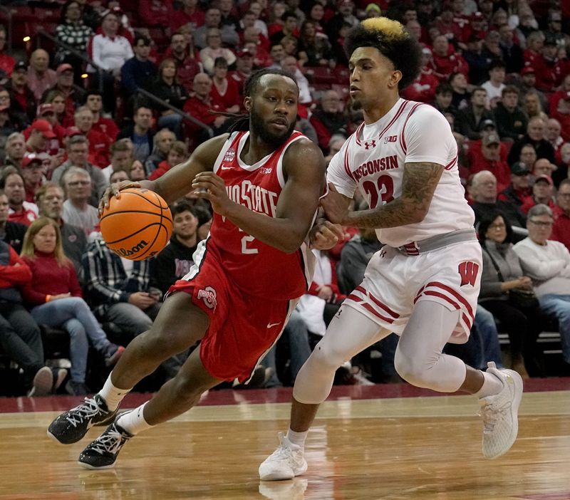 Feb 13, 2024; Madison, Wisconsin, USA;. Ohio State guard Bruce Thornton (2) turns the corner on Wisconsin guard Chucky Hepburn (23) during the first half of their game at the Kohl Center. Mandatory Credit: Mark Hoffman/Milwaukee Journal Sentinelf-USA TODAY Sports
