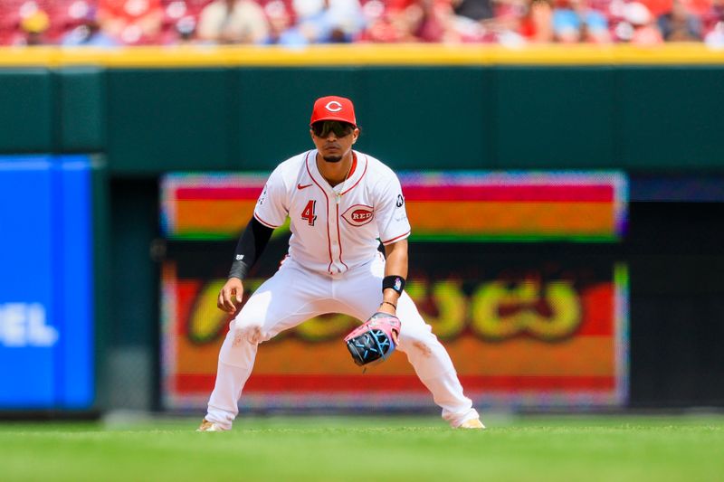 Jun 4, 2025; Cincinnati, Ohio, USA; Cincinnati Reds third baseman Santiago Espinal (4) prepares for the pitch in the eighth inning against the Milwaukee Brewers at Great American Ball Park. Mandatory Credit: Katie Stratman-Imagn Images