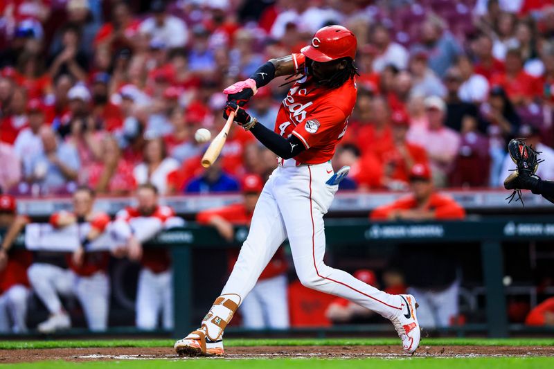 Sep 23, 2025; Cincinnati, Ohio, USA; Cincinnati Reds shortstop Elly De La Cruz (44) hits a two-run home run in  the second inning against the Pittsburgh Pirates at Great American Ball Park. Mandatory Credit: Katie Stratman-Imagn Images