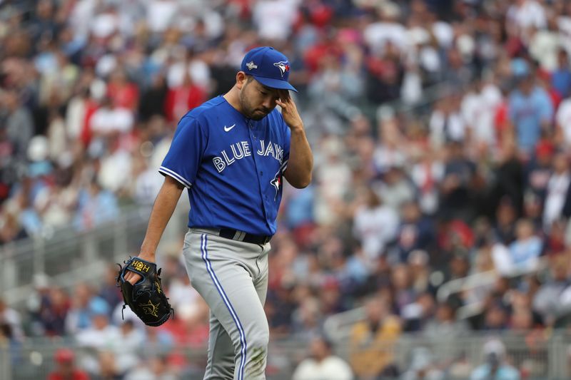 Oct 4, 2023; Minneapolis, Minnesota, USA; Toronto Blue Jays starting pitcher Yusei Kikuchi (16) leaves the mound in the fifth inning against the Minnesota Twins during game two of the Wildcard series for the 2023 MLB playoffs at Target Field. Mandatory Credit: Jesse Johnson-USA TODAY Sports